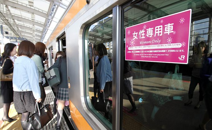 Women board a "women only" passenger train during morning rush hours in Tokyo October 7, 2011. East Japan Railway company, along with other railway companies, introduced the women only carriages in 2002 as part of efforts to tackle the problem of men who take advantage of overcrowding to grope female passengers. Picture taken October 7, 2011 REUTERS/Yuriko Nakao (JAPAN - Tags: SOCIETY)